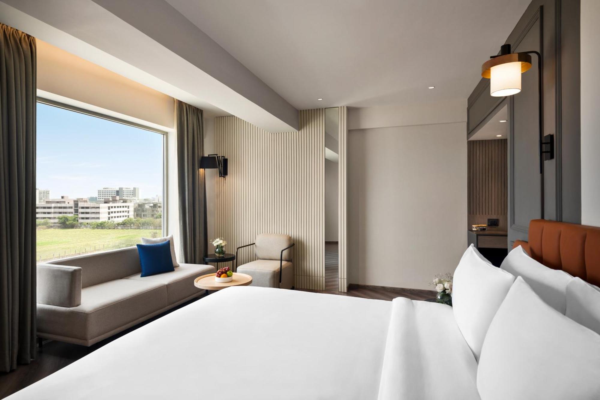 Ramada Encore By Wyndham Indore Nipania Exterior foto